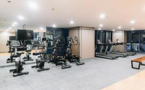 Rayrs Retreat 1BR with Balcony in Florence McKinley BGC